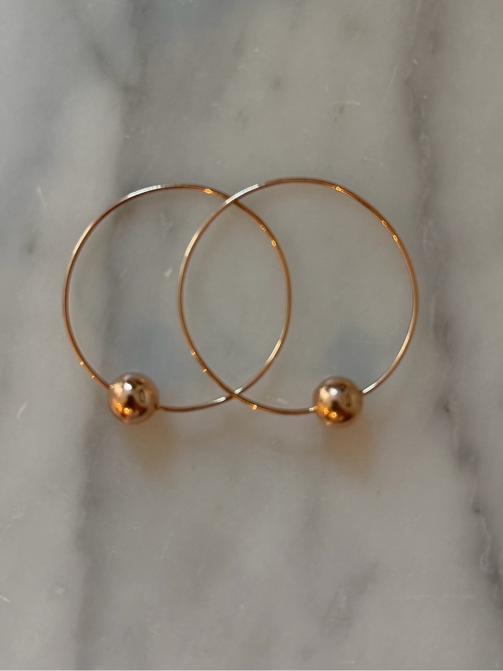 LANA hollow ball magic wire continuous hoop earrings